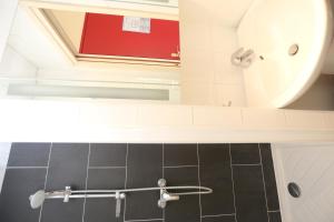 Appart'hotels O'Sullivans Bar and Hotel : photos des chambres