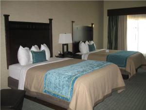 Queen Room with Two Queen Beds room in Little Missouri Inn & Suites Watford City