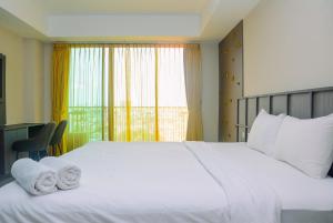 Cozy Studio Apartment at Nine Residence By Travelio