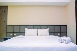 Cozy Studio Apartment at Nine Residence By Travelio