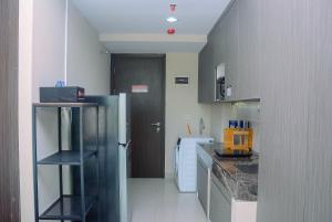 Cozy Studio Apartment at Nine Residence By Travelio