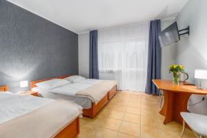 Awenturyn - Pokoje Apartamenty Noclegi Grzybowo