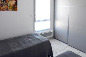 Appartements La Roseliere Appartement 2 chambres 6 couchages a 400 m de la plage : photos des chambres