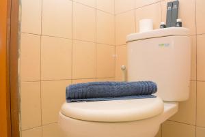 Comfort and Modern Studio Tifolia Apartment By Travelio