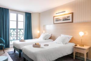 SOWELL HOTELS Le Beach : photos des chambres