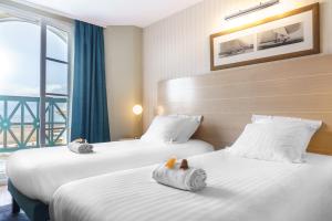 SOWELL HOTELS Le Beach : photos des chambres