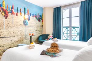 SOWELL HOTELS Le Beach : photos des chambres
