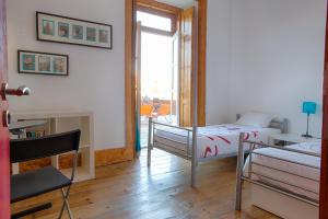 Twin Room with Shared Bathroom room in This Is Lisbon Hostel