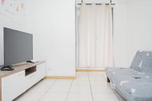 Comfort and Spacious 2BR Apartment M-Town Residence By Travelio