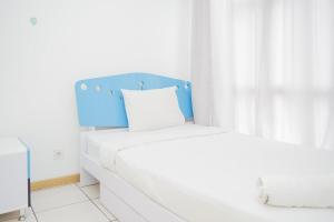 Comfort and Spacious 2BR Apartment M-Town Residence By Travelio