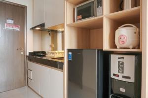 Fully Furnished with New Design Studio Ciputra International Apartment By Travelio