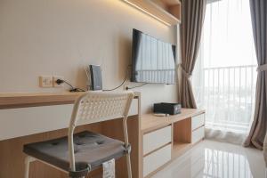 Fully Furnished with New Design Studio Ciputra International Apartment By Travelio