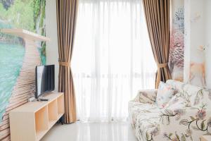 Homey and Relax at 1BR Asatti Apartment By Travelio