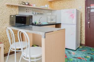 Homey and Relax at 1BR Asatti Apartment By Travelio