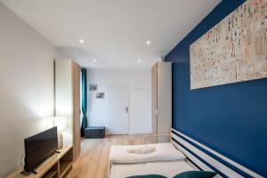 Appartements Le Musigny - Superbe studio moderne au calme proche place Valmy : photos des chambres