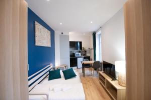 Appartements Le Musigny - Superbe studio moderne au calme proche place Valmy : photos des chambres