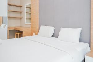Great Choice 1BR at Brooklyn Alam Sutera Apartment By Travelio