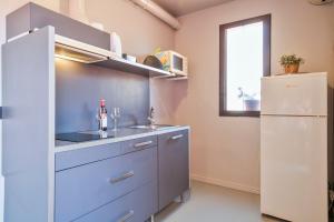 Three-Bedroom Apartment room in My Address in Plaza Real