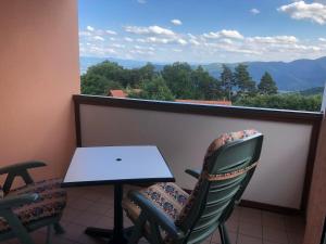 Appartements Trois-Epis, vue magnifique : photos des chambres