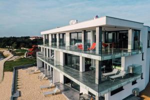 Jimmys Beach - direkt am Meer, tollem Blick und beheiztem Pool