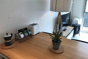 Appartements Le Vert Bois - calme, verdure, terrains de tennis : photos des chambres