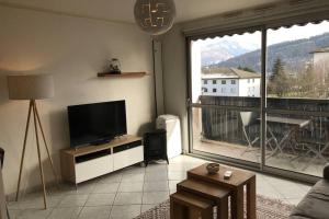 Appartements Le Vert Bois - calme, verdure, terrains de tennis : photos des chambres