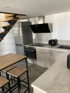 Appartements studio meuble du bourg : photos des chambres