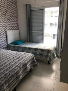 Apto temp litoral Pé na areia INDAIÁ PRAIA CLUB