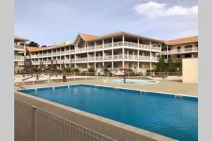 Maisons de vacances Maison entre Le Pyla et Arcachon, piscine commune : photos des chambres