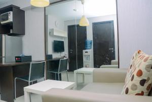 Cozy and Minimalist Kebagusan City 2BR Apartment By Travelio