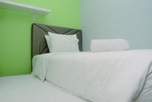 Comfortable 2BR Bassura City Apartment near Bassura Mall By Travelio