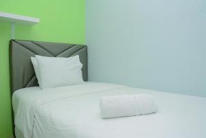 Comfortable 2BR Bassura City Apartment near Bassura Mall By Travelio