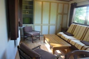 Chalets 3 Gites - Relais Du Saussay in Pertheville Ners : photos des chambres