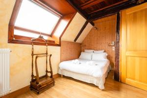 Appartements Schriner Huss - Chambres d'hotes & Gites : Chambre Familiale JANALA