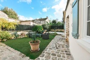 Appartements Instant Fleury, studio cosy avec jardin secret : photos des chambres