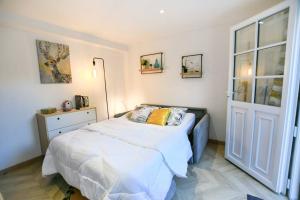 Appartements Instant Fleury, studio cosy avec jardin secret : photos des chambres