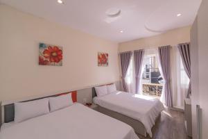 Phòng 4 người có ban công (Quadruple Room with Balcony)