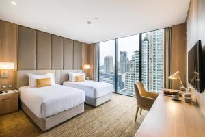 Phòng Đẳng Cấp Hai Giường Đơn (Premier Twin Room)