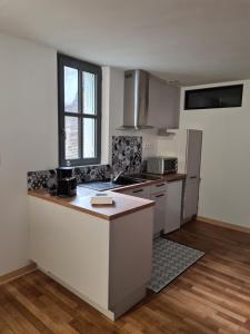 Appartements Les Logis du rempart : photos des chambres