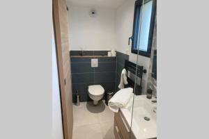 Appartements Le Clos des Feugrais : photos des chambres