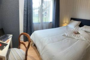 Appartements Le Clos des Feugrais : photos des chambres
