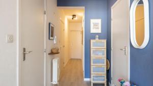 Zonnig en gezellig appartement met zijdelings zeezicht en zwembad in Koksijde