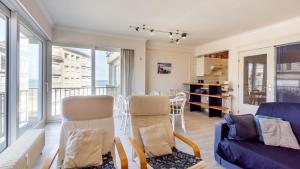 Zonnig en gezellig appartement met zijdelings zeezicht en zwembad in Koksijde