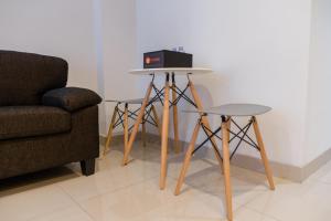 Comfy Studio At Dago Suites Apartment By Travelio