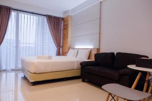 Comfy Studio At Dago Suites Apartment By Travelio