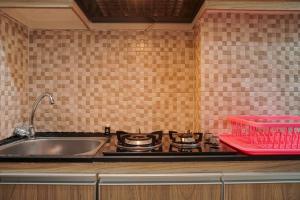 Chic and Cozy Studio at Tifolia Apartment By Travelio