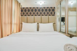 Chic and Cozy Studio at Tifolia Apartment By Travelio