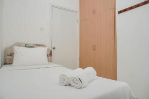 Fully Furnished with Comfortable 2BR Grand Palace Kemayoran Apartment By Travelio