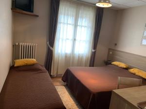 Hotels Au Vieux Puits : Chambre Triple Standard