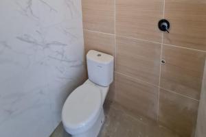 Krisan Guest House Syariah Banjarbaru Mitra RedDoorz